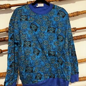 Vibrant Blue Crewneck Sweater with Geometric Pattern